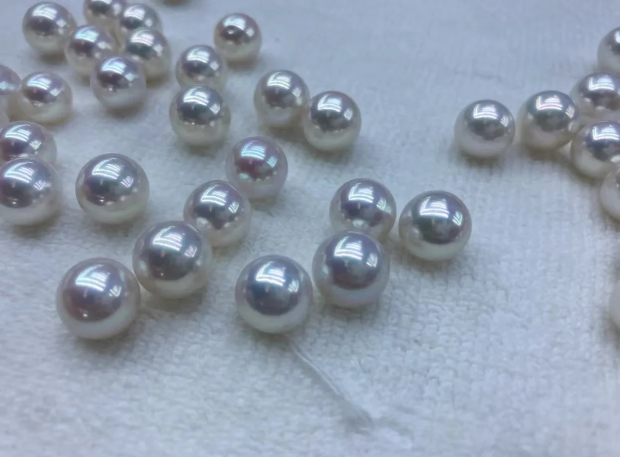 A04.ćLivećSnow white Eddison Pearls Oyster 12mm-15mm